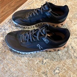 On Running women’s Black and Tan Athletic Shoes